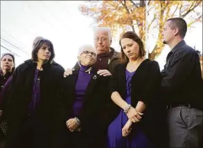  ?? Brian A. Pounds / Hearst Connecticu­t Media file photo ?? Family members of Lori Jackson Gellatly spoke with the media following Scott Gellatly's sentencing for murder at Superior Court in Milford on November 17, 2015. At center were Lori Gellatly's parents, Merry and Douglas Jackson. Second from right was Lori's sister, Kacey Mason, who testified in Washington on Wednesday.