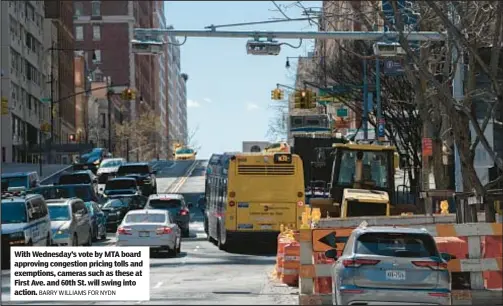  ?? BARRY WILLIAMS FOR NYDN ?? With Wednesday’s vote by MTA board approving congestion pricing tolls and exemptions, cameras such as these at First Ave. and 60th St. will swing into action.