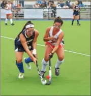  ?? SAM STEWART - DIGITAL FIRST MEDIA ?? Spring-Ford tries to get the ball upfield but the pass is deflected by the stick of Perkiomen Valley’s Gabby Martina.