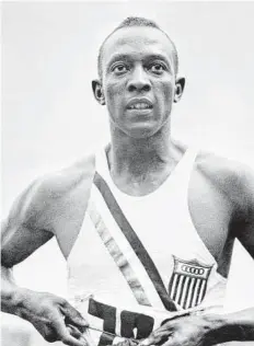  ?? AFP / Getty Images ?? The real-life Jesse Owens is shown in this August 1936 photo during the Olympic Games in Berlin.