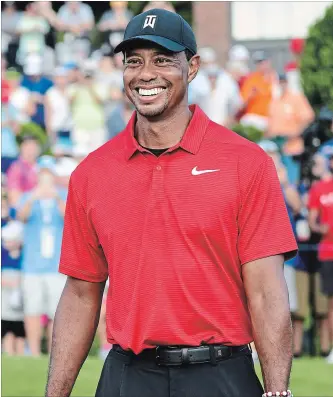  ?? JOHN AMIS THE ASSOCIATED PRESS ?? Tiger Woods’ victory at the Tour Championsh­ip on Sunday in Atlanta was his 80th of his PGA career, two short of Sam Snead’s record, which is now very much in play.