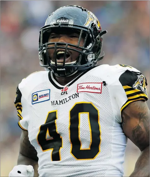  ?? — THE CANADIAN PRESS FILES ?? Defensive end Eric Norwood is the latest member of the Hamilton Tiger-Cats to suffer an injury. Hamilton has had to shift several players around, including placing Norwood on the six-game injured list after a domestic injury. He led the team in sacks...