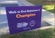  ?? ?? A Walk to End Alzheimer’’s sign from a White Horse Village community walk in 2021.