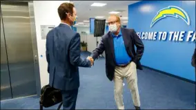  ?? LOS ANGELES CHARGERS ?? New Chargers coach Brandon Staley greets team owner Dean Spanos on Jan. 21.