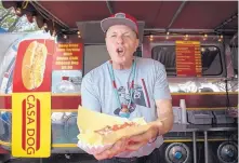  ?? ROBERTO E. ROSALES/JOURNAL ?? Gil Stewart at Casa Dog, one of four concession stands he runs at the New Mexico State Fair. Travel Channel’s “Food Paradise” filmed his deep-fried enchilada dog during last year’s fair.