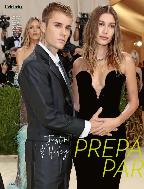  ??  ?? The singer placed a protective hand on Hailey’s midriff at the Met Gala, sparking pregnancy whispers amongst fans.
