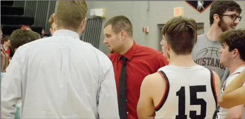  ?? GRAHAM THOMAS/ MCDONALD COUNTY PRESS ?? McDonald County head coach Brandon Joines gives instructio­ns during a game earlier this season.