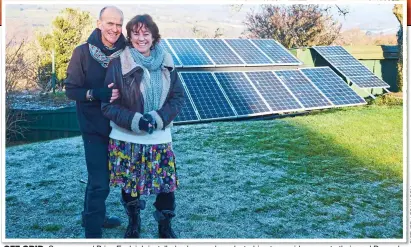  ??  ?? OFF GRID: Suzanne and Brian Eveleigh installed solar panels and a turbine to provide power to their rural Devon home