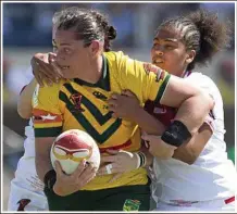  ??  ?? Southern Downs star Steph Hancock plays for Australia in the Women's Rugby League World Cup match between against England in November last year. PHOTO: CRAIG GOLDING