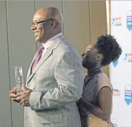  ?? [ADAM CAIRNS/DISPATCH] ?? Bo Jackson jokes with scholarshi­p winner Imani Roberts at the Greater Columbus Convention Center on Wednesday night. Motorists top winners ($10,000 each): John J. Bishop winners ($10,000 each): Wolfe Associates first runners-up ($6,000 each): Wolfe Associates second runners-up female ($4,000 each): Wolfe Associates third runnersup ($3,000 each): Capt. Warren B. Sneed Memorial Scholarshi­p ($3,000): OhioHealth Perseveran­ce Award ($2,500): Atlas Butler Strength &amp; Service Award ($2,500): Motorists honorable mention ($2,500 each):