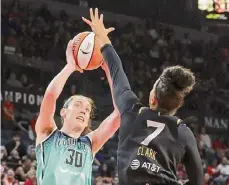  ?? Ethan Miller/getty Images ?? Breanna Stewart of the New York Liberty shoots against Alysha Clark of the Las Vegas Aces in the first quarter of their game on Aug. 17 in Las Vegas.