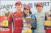  ??  ?? Winner Jamie Chadwick (centre) flanked by second-placed Patrick Pasma (left) and third-placed Michaelang­elo Amendola in Chennai.