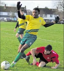  ??  ?? Smeeth & Brabourne (red) up against Ashford United 3rds