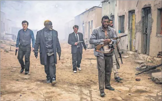  ??  ?? Bewitching: In Five Fingers for Marseilles, the outlaw Tau, played by Vuyo Dabula (top right), returns to the fictional town of to Marseilles to seek a peaceful life — only to find he must fight for his townsfolk once more. Warren Masemola and Hamilton...