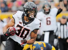  ?? CHRIS JACKSON THE ASSOCIATED PRESS FILE PHOTO ?? Oklahoma State’s Chuba Hubbard has been named the winner of the Jon Cornish Trophy as the top Canadian playing NCAA football.