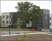  ??  ?? Constructi­on continues on Network in Fayettevil­le, the city’s first mixed-use net zero building that annually will produce as much energy as it needs to operate. The building is expected to be finished by July.
(NWA Democrat-Gazette/David Gottschalk)