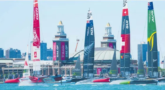  ?? Photo / AP ?? The New Zealand Sailgp team gets into it on race day one on Lake Michigan yesterday.