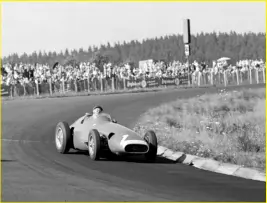  ?? ?? Fangio slides the Maserati around the Nordschlei­fe in 1958