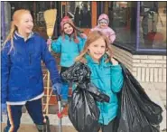  ?? SUBMITTED PHOTO - KCP ?? Kutztown Area Middle and Elementary School students volunteeri­ng to pick up trash at the KPC Sunday Clean Up on March 25.