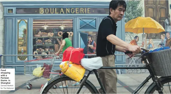  ?? Daniele Mattioli for The National ?? Food shopping with a Parisian theme in Shanghai