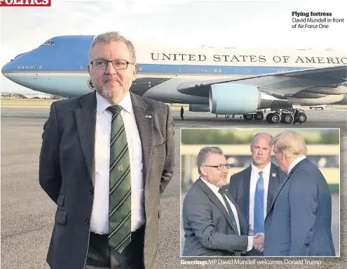 ??  ?? Flying fortress David Mundell in front of Air Force One Greetings MP David Mundell welcomes Donald Trump
