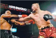  ?? PHOTO COURTESY OF HBO SPORTS ?? Chinese heavyweigh­t Zhang Zhilei is 18-0 with 14 KOs and is now ranked No 8 by the WBO. With five straight KO victories in 2017, he’s put himself in line for a shot at a piece of the world championsh­ip.