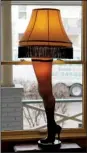  ?? Democrat-Gazette file photo ?? The leg lamp has been an emblem of Christmas ever since the movie A Christmas
Story in 1983. Costing more than $100, this full-size model — one of several versions — is for the well-heeled collector.