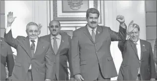  ?? ARIANA CUBILLOS/AP ?? From left, Cuba’s President Raul Castro, Antigua and Barbuda’s Prime Minister Gaston Browne, Venezuela’s President Nicolas Maduro and Saint Vincent and the Grenadines’ Prime Minister Ralph Gonsalves at the start of the ALBA meeting in Caracas.