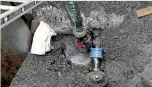  ??  ?? The problem was caused by a broken valve attached to the large, white pipe at the top of the second image.