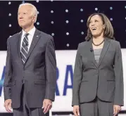  ?? BRIAN CAHN TNS ?? Joe Biden and Kamala Harris pose during a commercial break at the second of two Democratic Debates in Detroit hosted by CNN, July 31, 2019.