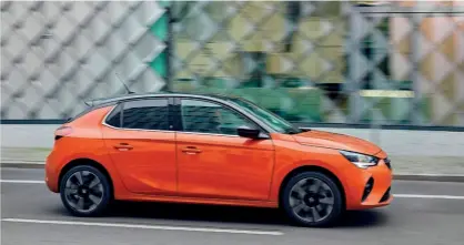  ??  ?? Corsa-e looks almost identical to a convention­ally powered Corsa, although its rear wheels are set slightly farther aft