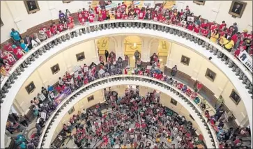  ?? Ricardo Brazziell Austin American-Statesman ?? TEXANS fill the Capitol rotunda in Austin in May 2017 to protest what they call the “show your papers” law.