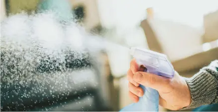  ?? CATHERINE FALLS COMMERCIAL/GETTY ?? Believe it or not, you’ll actually use less cleaner if you spray it directly on your surface than on a cloth.