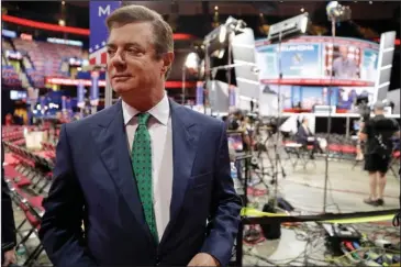  ?? The Associated Press ?? MANAFORT: In this photo taken July 17, 2016, Paul Manafort talks to reporters on the floor of the Republican National Convention at Quicken Loans Arena in Cleveland. The Senate Judiciary Committee plans to bring in Manafort for questionin­g of the Trump...