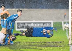  ??  ?? Rothes keeper Robert Donaldson is beaten, however the goal was disallowed