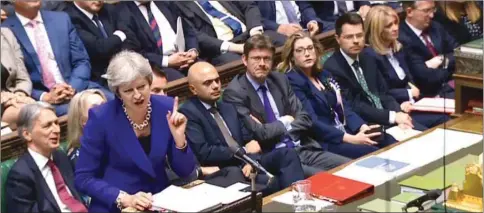  ??  ?? Theresa May speaks during Prime Minister’s Questions (PMQs) in the House of Commons in London yesterday.