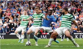  ?? Photograph: Ian MacNicol/Getty Images ?? Celtic’s Carl Starfelt and Fashion Sakala lunge for the ball, resulting in Rangers’ extratime winner.