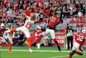  ?? ASSOCIATED PRESS ?? ARIZONA CARDINALS cornerback Patrick Peterson (21) intercepts a pass in the end zone intended for Cleveland Browns wide receiver Odell Beckham (13) during the first half of Sunday’s game in Glendale.