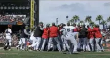  ?? THE ASSOCIATED PRESS ?? Players from Washington and San Francisco eighth inning Monday afternoon. brawl in the