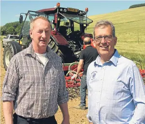  ??  ?? RNAS Stock Tech chairman John Gordon, left, and RNAS director George Duncan of grass seed merchants Agri Solutions.