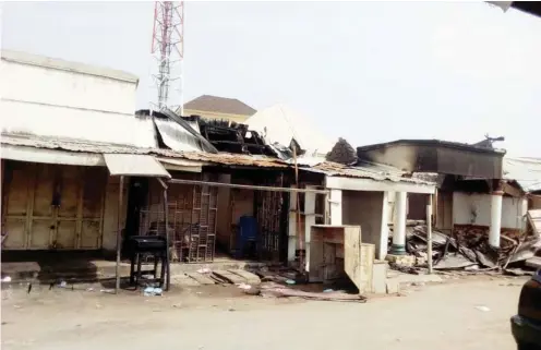  ??  ?? Shops at Jalingo market allegedly set ablaze by youths gangs.