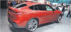  ??  ?? Der BMW X4, ein SUV-Coupé für die Mittelklas­se, soll im Sommer zu den Händlern rollen.