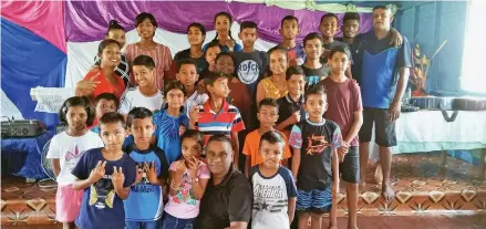  ?? ?? Victory Christian Fellowship church pastor, Samuel Jeet, with children and youths during the Fun Day at their premises in Volovi, Labasa on November 5, 2022.