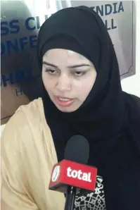  ?? — Supplied photo ?? Zubi Zaidi speaking to the media in India about her registry of domestic abuse victims.