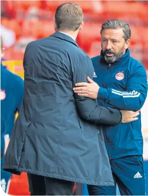  ??  ?? Derek McInnes with Steven Gerrard after Aberdeen had lost to Rangers last Saturday. But that was just the start of the Dons boss’ problems