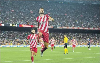  ?? FOTO: PERE PUNTÍ ?? Stuani y Portu celebran un tanto del atacante charrúa en el Camp Nou ante el Barcelona