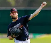  ?? CURTIS COMPTON / CCOMPTON@AJC.COM ?? Braves reliever A.J. Minter says he was involved in aminor car accidentWe­dnesday and started to feel soreness two days later.