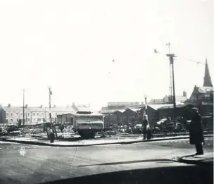  ??  ?? ■ Constructi­on of Jarrow Shopping Centre. Photograph taken from Market Square, 1956, from the collection of Paul Perry