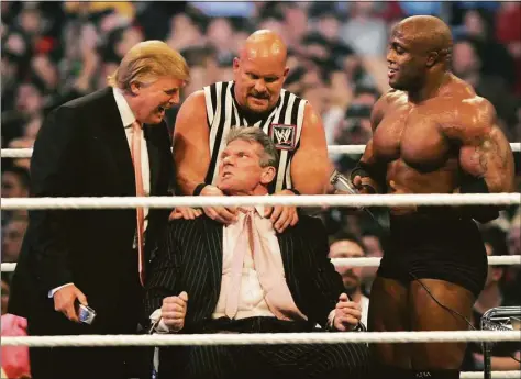  ?? Bill Pugliano / Getty Images file photo ?? WWE chairman Vince McMahon, center, has his head shaved by Donald Trump, left, and Bobby Lashley, right, while being held down by '”Stone Cold” Steve Austin after losing a bet in the Battle of the Billionair­es at the 2007 World Wrestling Entertainm­ent's Wrestleman­ia at Ford Field on April 1, 2007 in Detroit, Mich. Umaga was representi­ng McMahon in the match when he lost to Bobby Lashley who was representi­ng Trump.