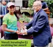 ?? ?? Venuli Jayasinghe (L) receiving her award